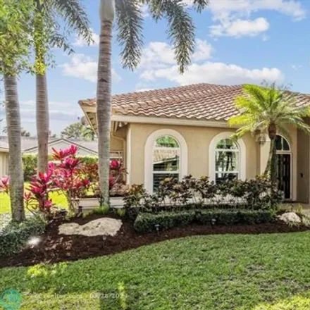 Buy this 4 bed house on 5018 Northwest 104th Way in Brookside North, Coral Springs