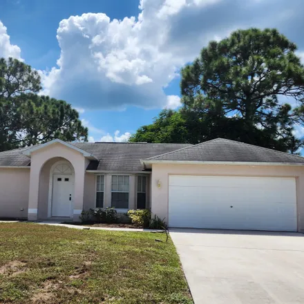 Rent this 3 bed house on 1442 Southwest Abacus Avenue in Port Saint Lucie, FL 34953