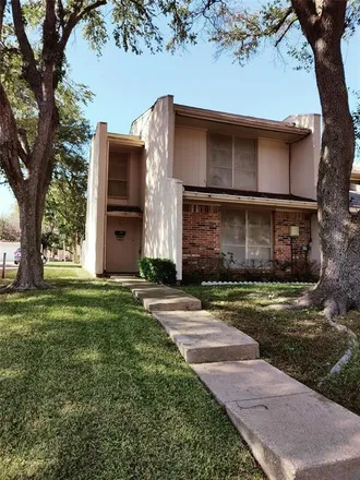 Rent this 4 bed townhouse on 347 Valley Park Drive in Garland, TX 75043