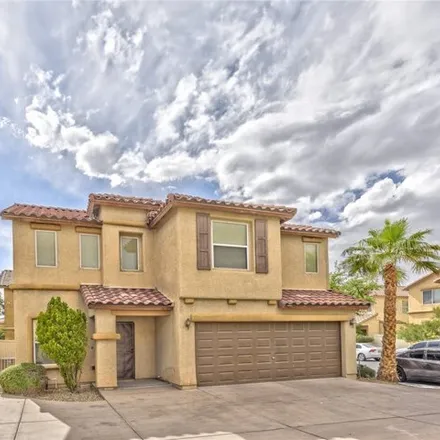Rent this 4 bed house on 1155 East Blue Magenta Avenue in Paradise, NV 89183