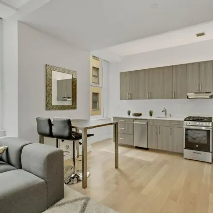 Buy this studio condo on 55 Wall Street in New York, NY 10005