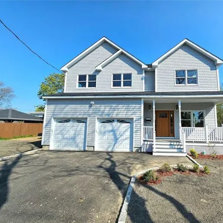 Buy this 4 bed house on 15 Fordham St in Patchogue, New York