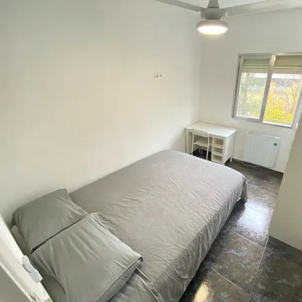 Rent this 4 bed room on Calle del Estroncio in 28021 Madrid, Spain