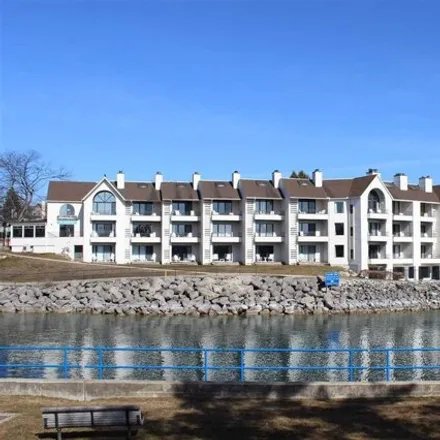 Buy this 1 bed condo on 124 Thistle Downs Drive in Charlevoix, MI 49720