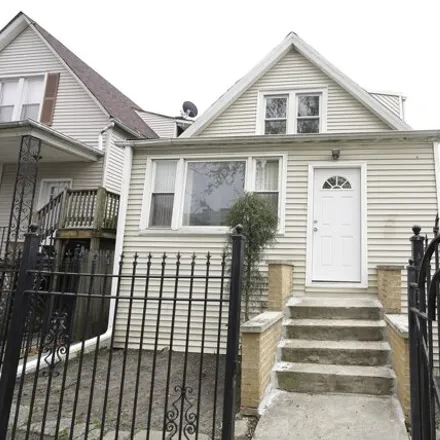 Buy this 5 bed house on 1524 North Keating Avenue in Chicago, IL 60639