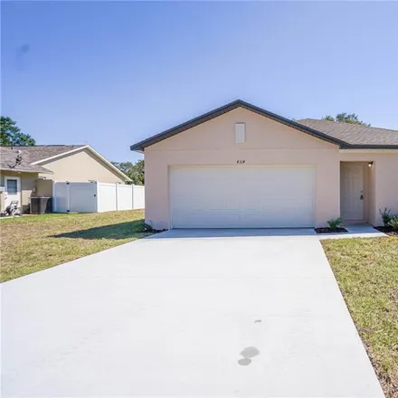 Rent this 4 bed house on 4314 Goldcoast Avenue in Spring Hill, FL 34609