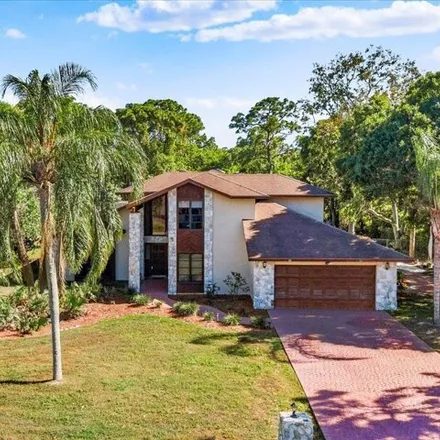 Buy this 4 bed house on 895 Woodlands Dr in Port Saint Lucie, Florida