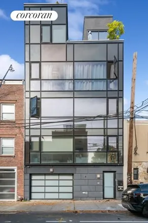 Buy this 6 bed townhouse on 398 Bond Street in New York, NY 11231