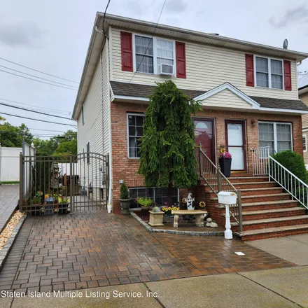 Buy this 3 bed house on 144 Labau Avenue in New York, NY 10301