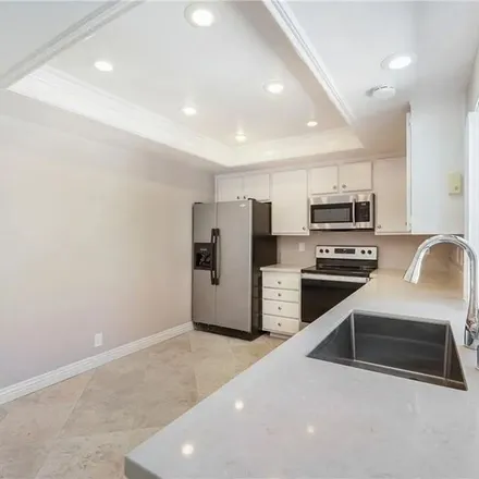 Rent this 4 bed apartment on 4886 in 4892 Paseo de Vega, Irvine