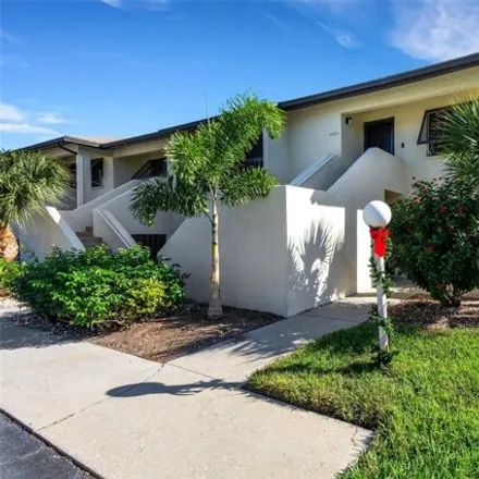 Buy this 2 bed condo on Longwater Chase in The Meadows, Sarasota County