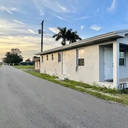 Buy this 3 bed house on 309 West 7th Street in Pahokee, Palm Beach County