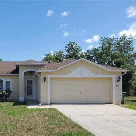 Buy this 3 bed house on 1932 Lavina St in Deltona, Florida