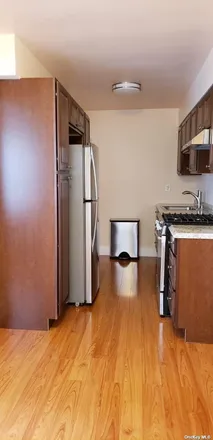 Rent this 2 bed apartment on 39-71 59th Street in New York, NY 11377