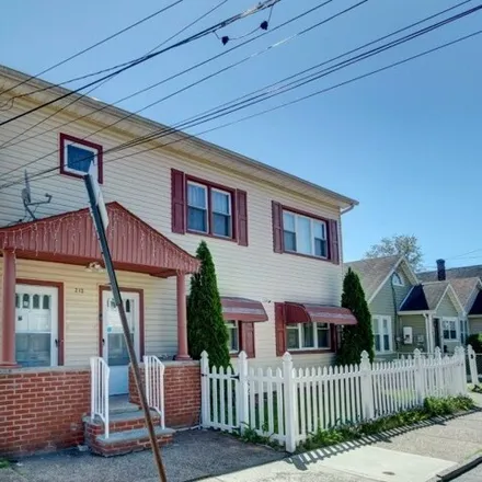 Buy this 6 bed house on 211 East 26th Street in Paterson, NJ 07514