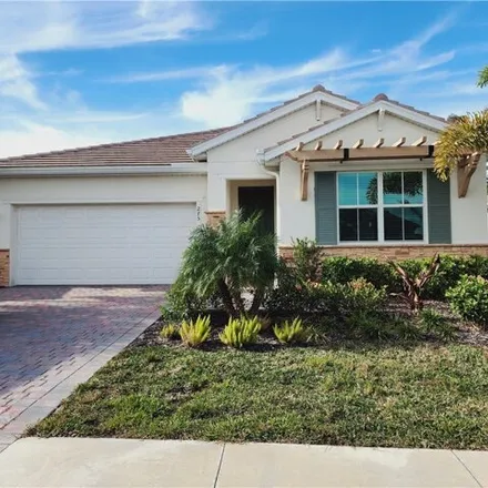 Rent this 2 bed house on Tamarindo Lane in Collier County, FL 34113