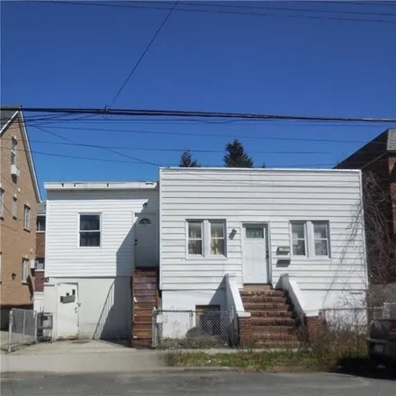 Buy this 3 bed house on 1950 Burke Avenue in New York, NY 10469