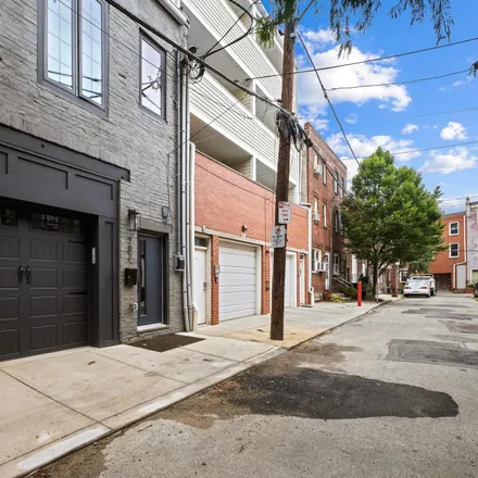 Rent this 4 bed townhouse on 702 Alter Street in Philadelphia, PA 19147