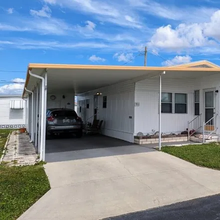 Buy this studio apartment on 757 52nd Avenue Plaza West in South Bradenton, FL 34207