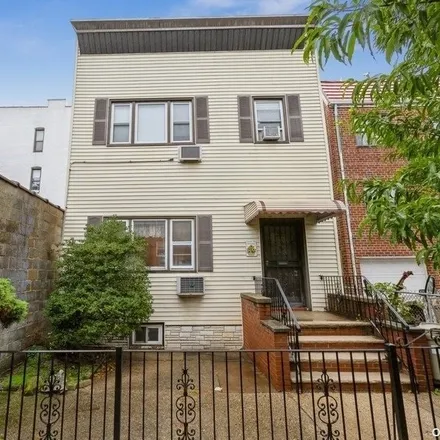 Buy this 5 bed townhouse on 25-81 38th Street in New York, NY 11103