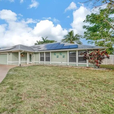 Buy this 5 bed house on 1962 NE San Carlos Calle in Jensen Beach, Florida
