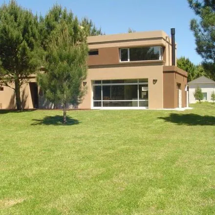 Rent this 4 bed house on unnamed road in Partido de Pinamar, 7167 Buenos Aires