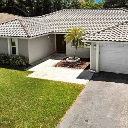 Buy this 4 bed house on 10138 Northwest 3rd Place in Coral Springs, FL 33071