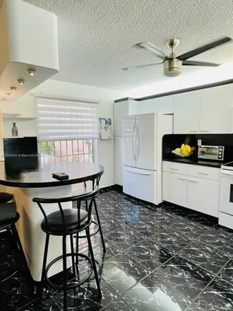 Rent this 2 bed townhouse on Three Islands Boulevard in Hallandale Beach, FL 33009