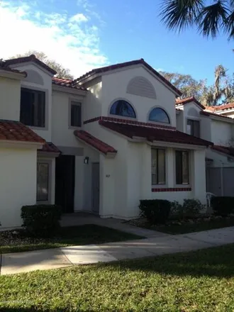 Rent this 2 bed condo on 1111 Country Club Drive in Titusville, FL 32780