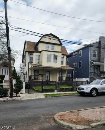 Buy this 11 bed house on 316 Chadwick Avenue in Newark, NJ 07112