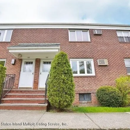 Buy this 2 bed condo on 141 Arlo Road in New York, NY 10301