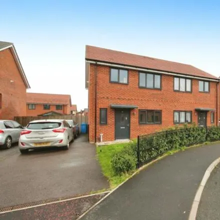 Rent this 3 bed duplex on Weaving Way in Manchester, M18 7SX