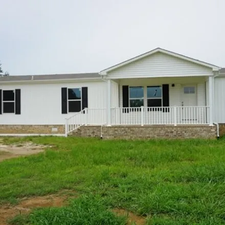 Buy this studio apartment on 437 Peckerwood Point Road in Dyer County, TN 38059