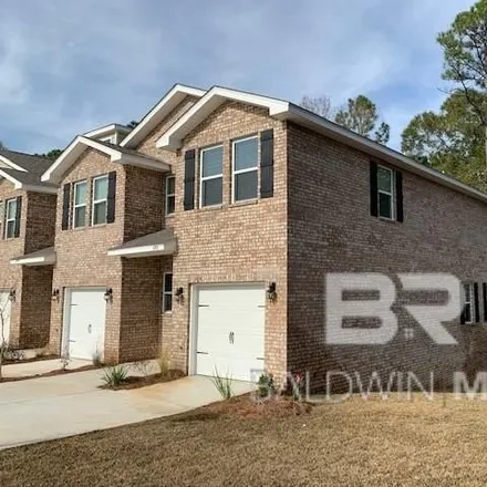 Rent this 3 bed townhouse on 6797 Spaniel Drive in Spanish Fort, AL 36527
