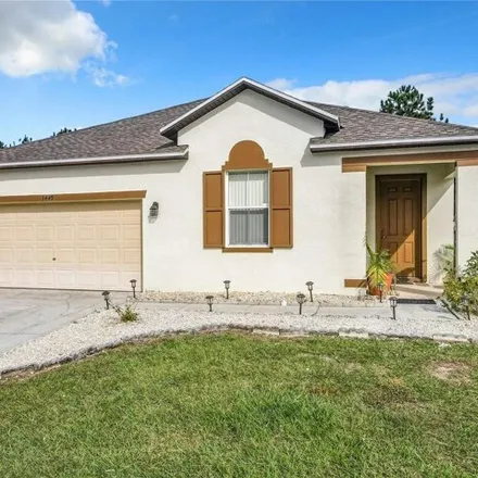 Buy this 4 bed house on 1461 Pine Ridge Drive in Polk County, FL 33896