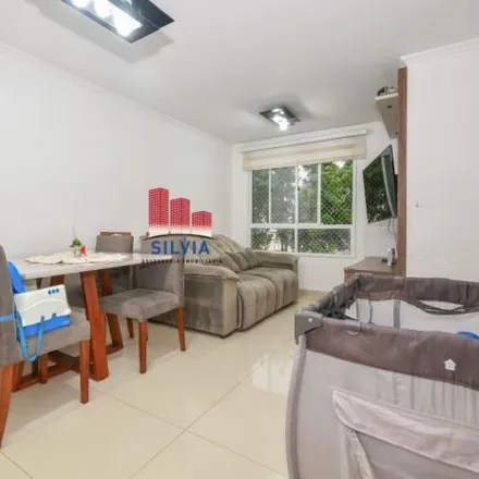 Buy this 3 bed apartment on Rua João Bonat 1385 in Novo Mundo, Curitiba - PR