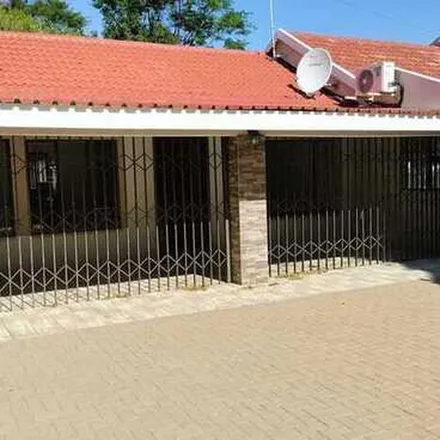 Rent this 4 bed apartment on Mozart Road in Wilgeheuwel, Roodepoort