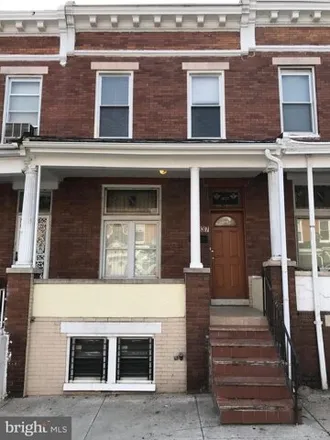 Buy this 4 bed house on 1637 East 25th Street in Baltimore, MD 21213