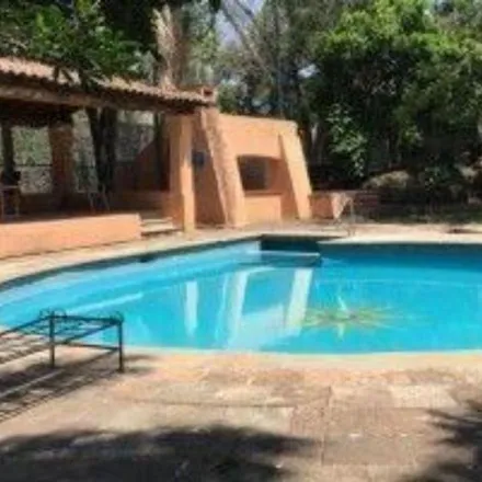 Buy this 6 bed house on Calle Paseo de las Fuentes in Hacienda de las Flores, 62550 Jiutepec