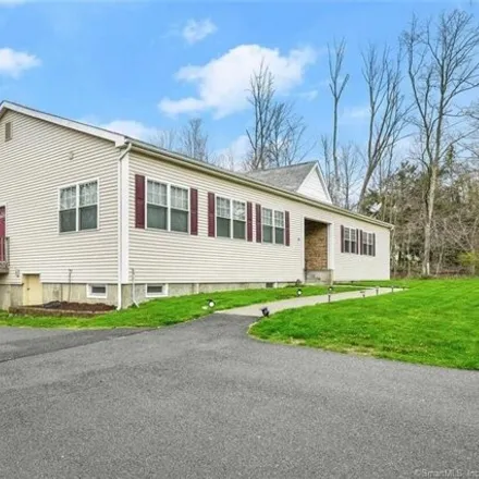 Buy this 4 bed house on Larkin State Park Trail in Oxford, CT 06488