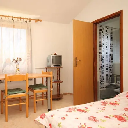 Rent this 1 bed apartment on 23282 Žman