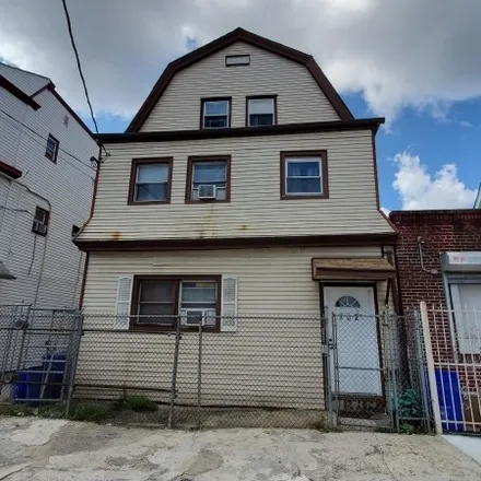 Buy this 7 bed townhouse on 704 Summer Avenue in Newark, NJ 07104