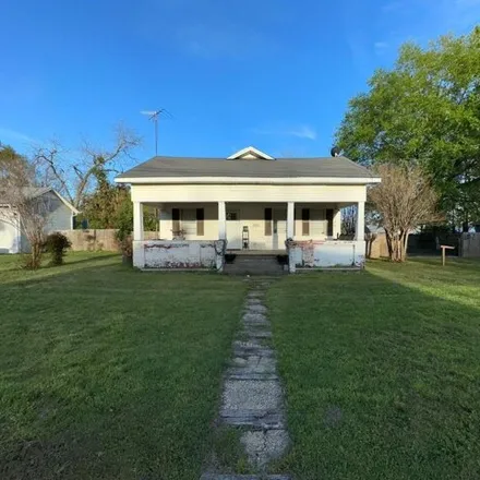 Buy this 4 bed house on 599 North Montgomery Street in Gilmer, TX 75644
