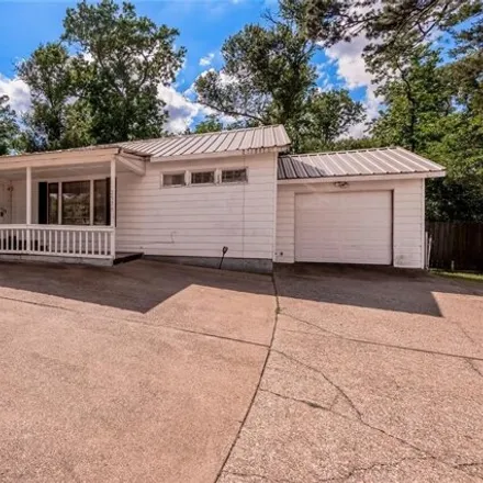 Rent this 3 bed house on 2538 Sycamore Avenue in Huntsville, TX 77340