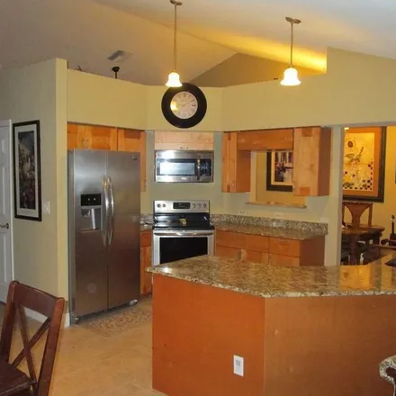 Rent this 3 bed apartment on 353 Mayfair Circle East in Palm Harbor, FL 34683