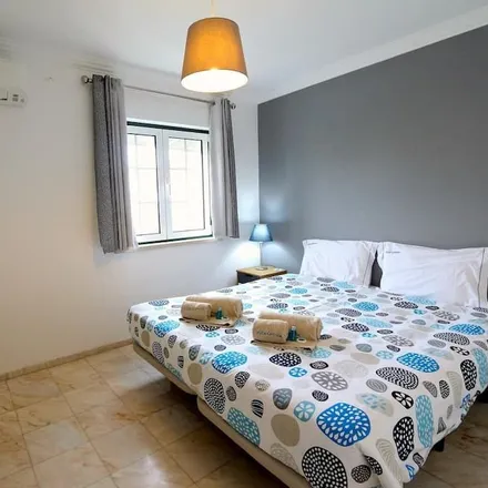 Rent this 6 bed house on Quarteira in Faro, Portugal