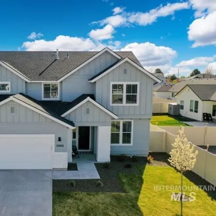 Buy this 4 bed house on North Burnte Peak Place in Nampa, ID 83687