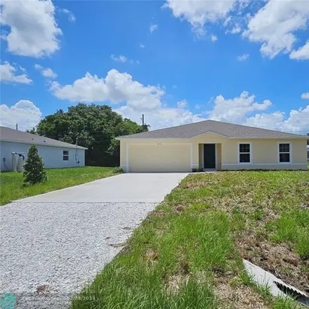 Rent this 4 bed house on 8735 100th Ct in Vero Beach, Florida