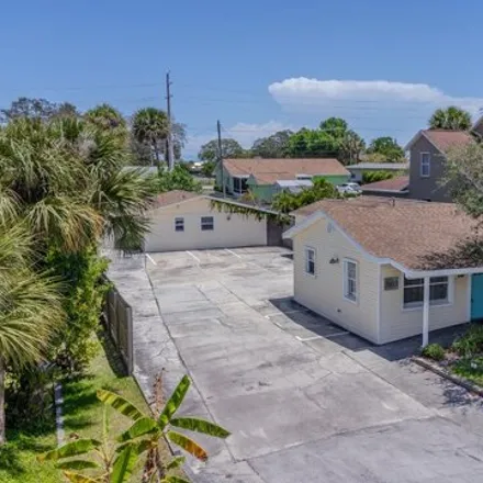 Buy this 4 bed house on 2067 Guava Avenue in Melbourne, FL 32935