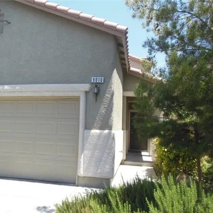 Rent this 4 bed house on 9058 College Green Street in Mountain's Edge, NV 89148